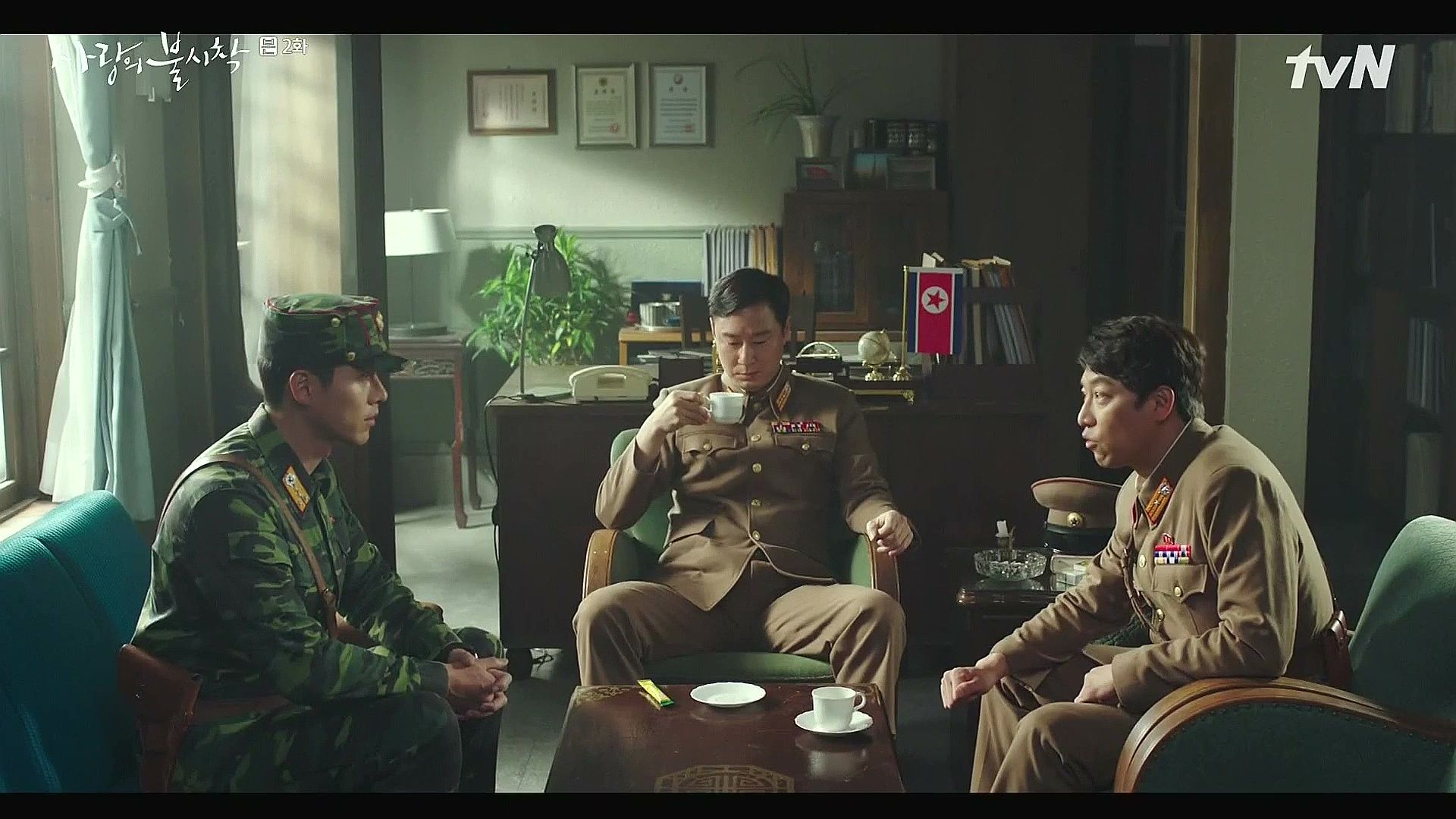 Crash Landing on You Captain Ri Jeong-hyeok, Cho Cheol-gang, and Senior Colonel talking